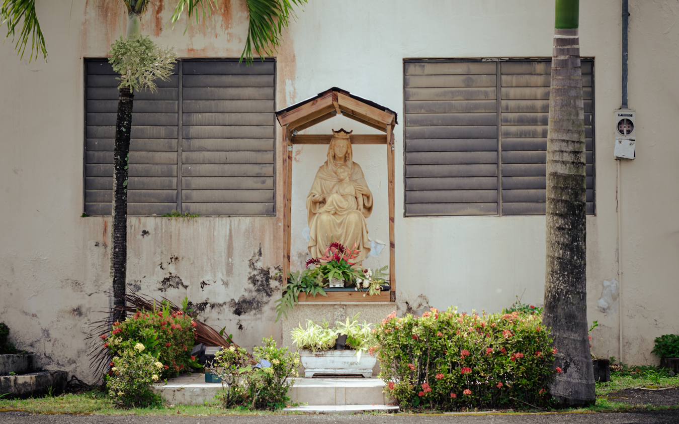 Abandoned church with weathered shrine in Río Grande, Puerto Rico